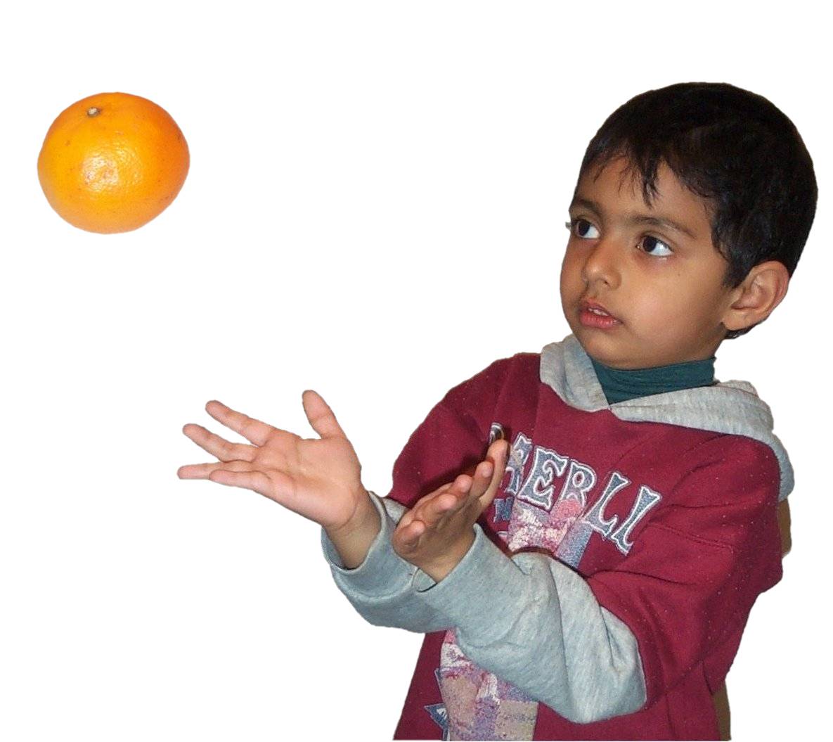 Boy catching orange.jpg